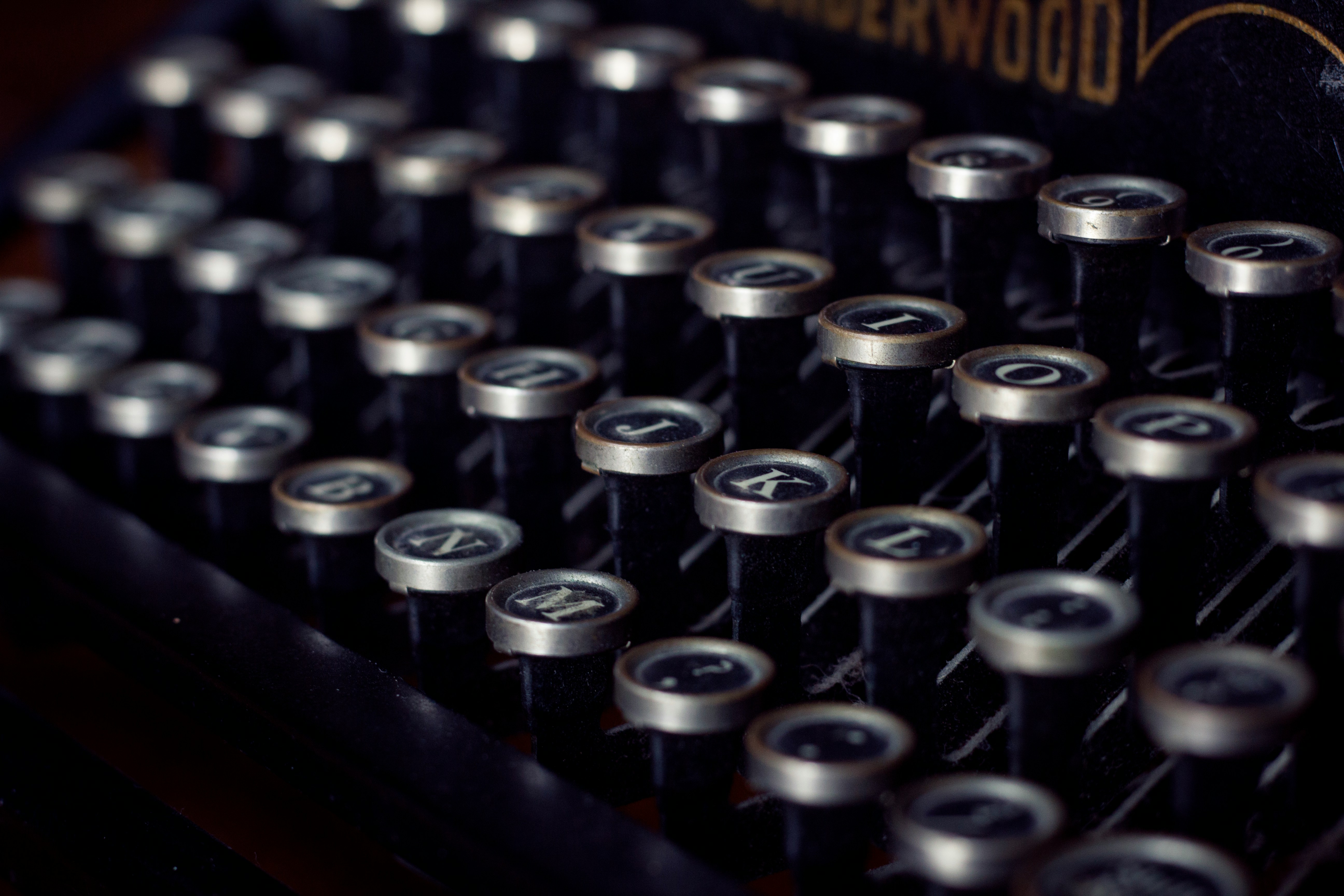 close up image of a type writer keyboard